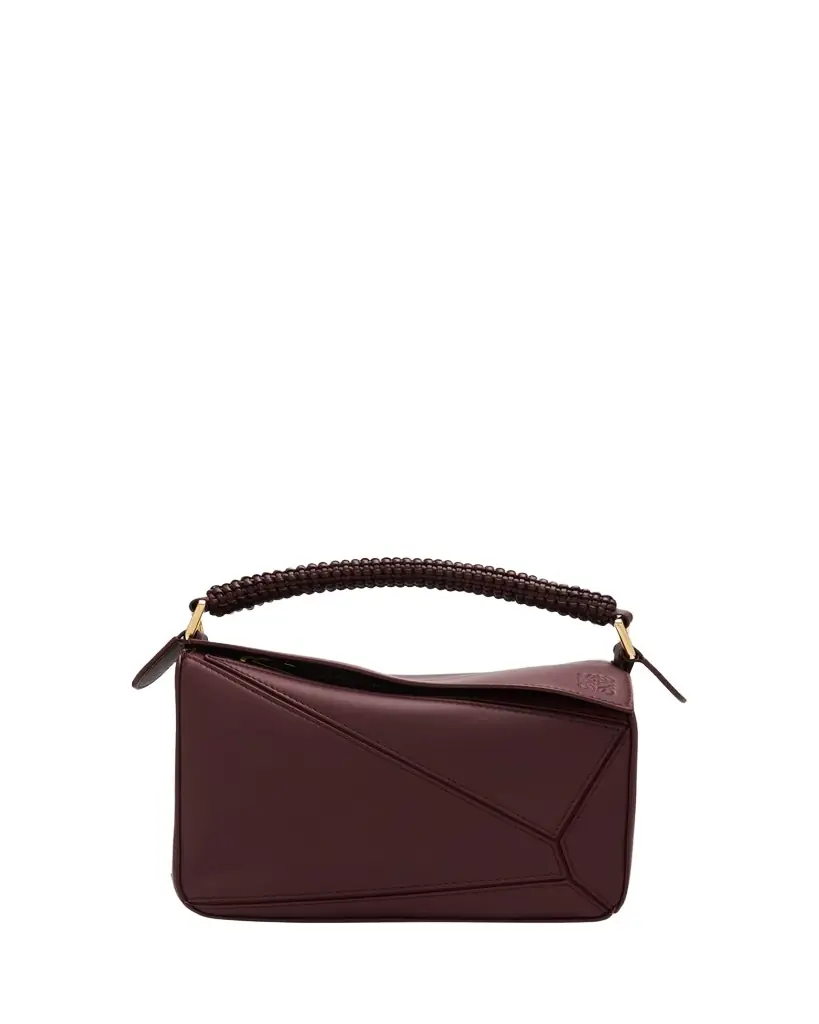 Loewe Puzzle Small Woven Top-Handle Bag in Leather | Image 1 Loewe Puzzle Small Woven Top-Handle Bag in Leather | Image 1