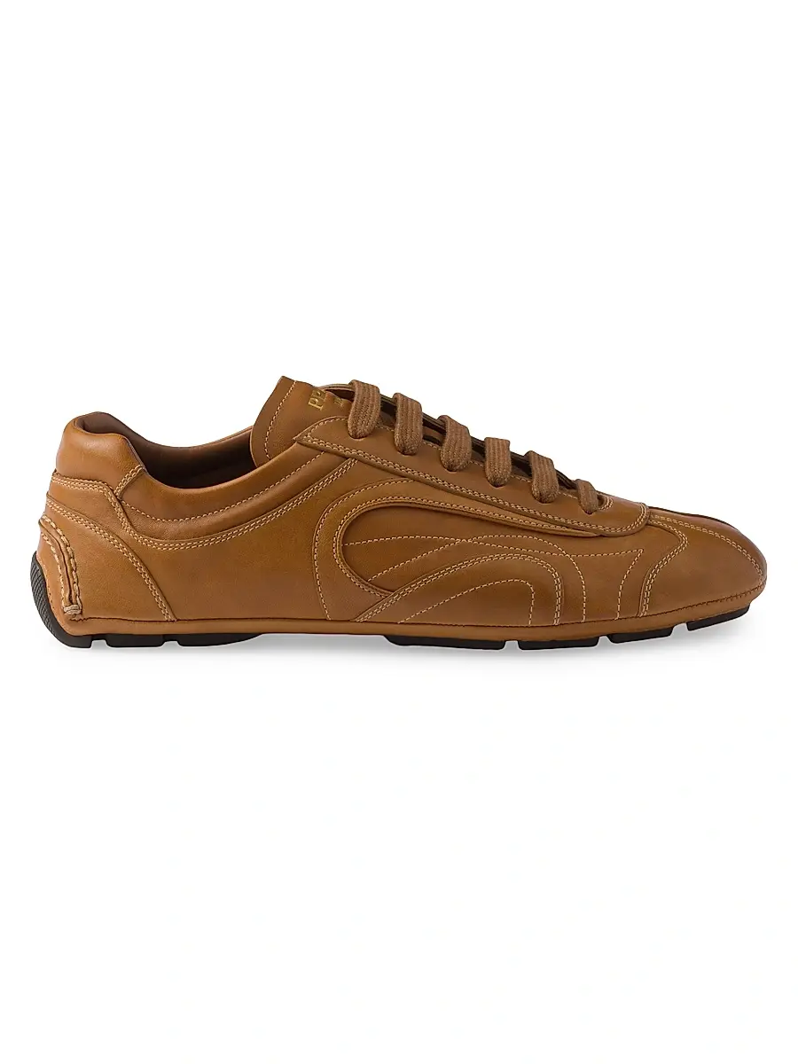 Prada Men's Montecarlo Re-Edition 2005 Antiqued Nappa Leather Sneakers - Brown | Image 1 Prada Men's Montecarlo Re-Edition 2005 Antiqued Nappa Leather Sneakers - Brown | Image 1