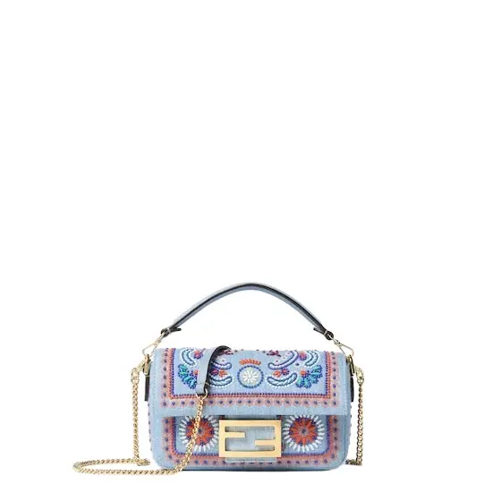 Fendi Iconic mini Baguette® bag made of organic cotton denim in | Image 1 Fendi Iconic mini Baguette® bag made of organic cotton denim in | Image 1