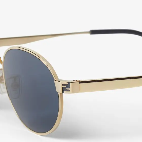 Fendi Metal oval sunglasses with a golden finish | Thumbnail 3