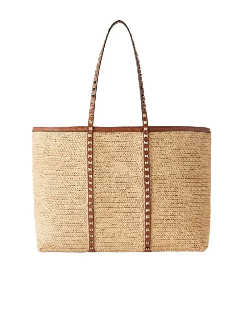 Valentino Garavani Rockstud Leather-trimmed Raffia Tote | Image 1 Valentino Garavani Rockstud Leather-trimmed Raffia Tote | Image 1
