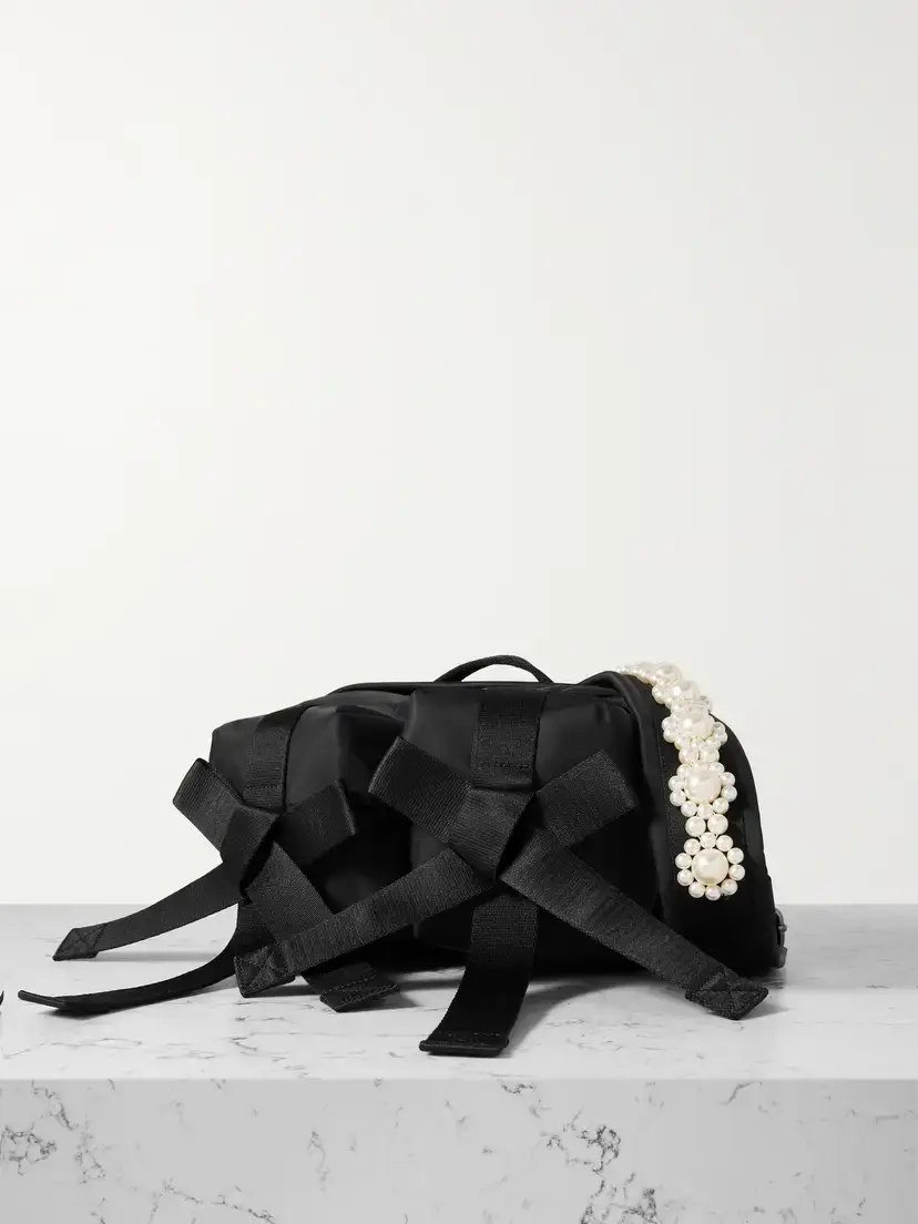 Simone Rocha Bow And Pearl-like Embellished Shell Belt Bag | Image 1 Simone Rocha Bow And Pearl-like Embellished Shell Belt Bag | Image 1
