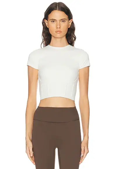 NikeSKIMS Matte Corset Short Sleeve Crop Top | Image 1 NikeSKIMS Matte Corset Short Sleeve Crop Top | Image 1