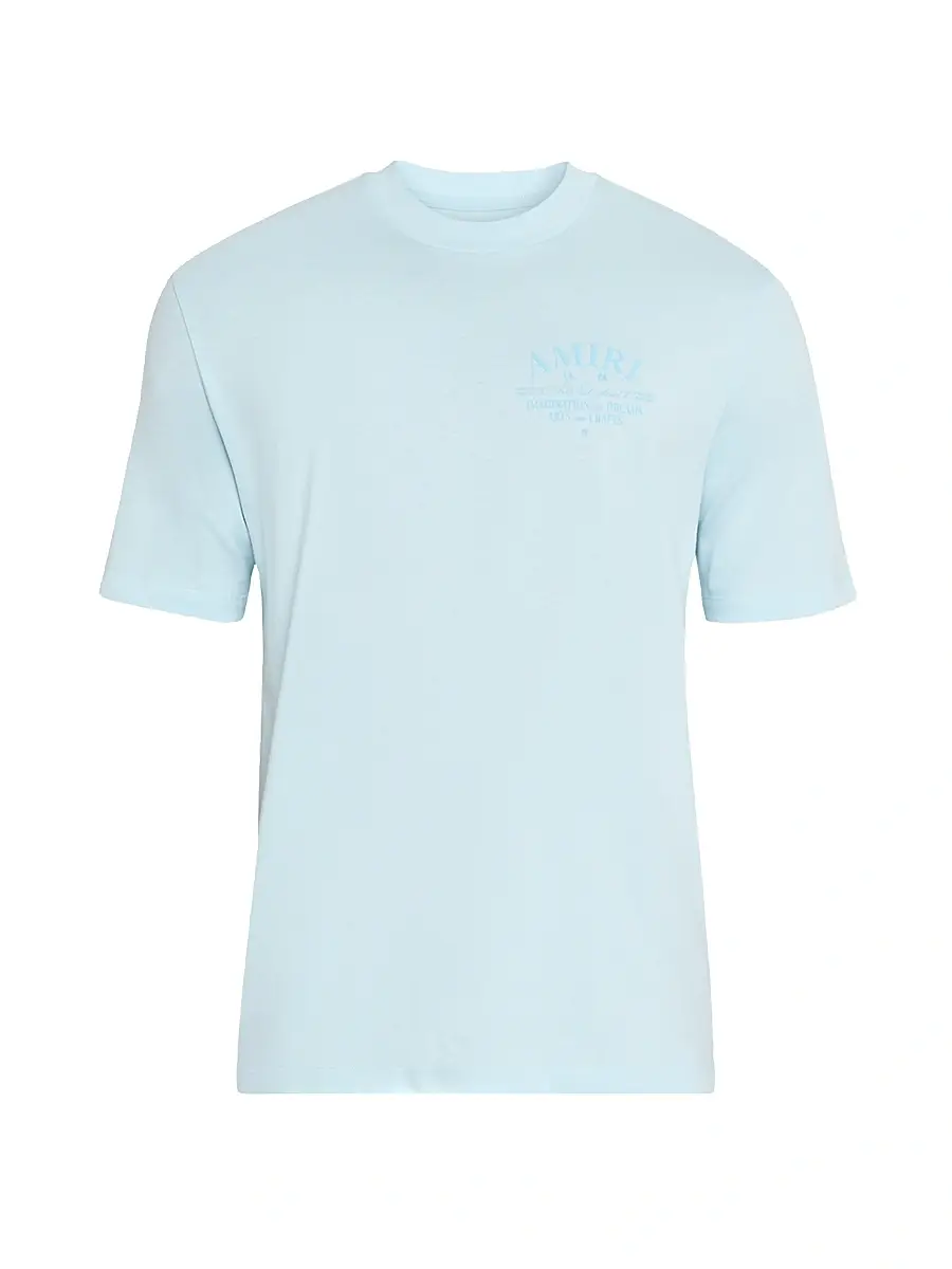AMIRI Men's Arts Logo Graphic Cotton T-Shirt - Light Blue | Image 1 AMIRI Men's Arts Logo Graphic Cotton T-Shirt - Light Blue | Image 1