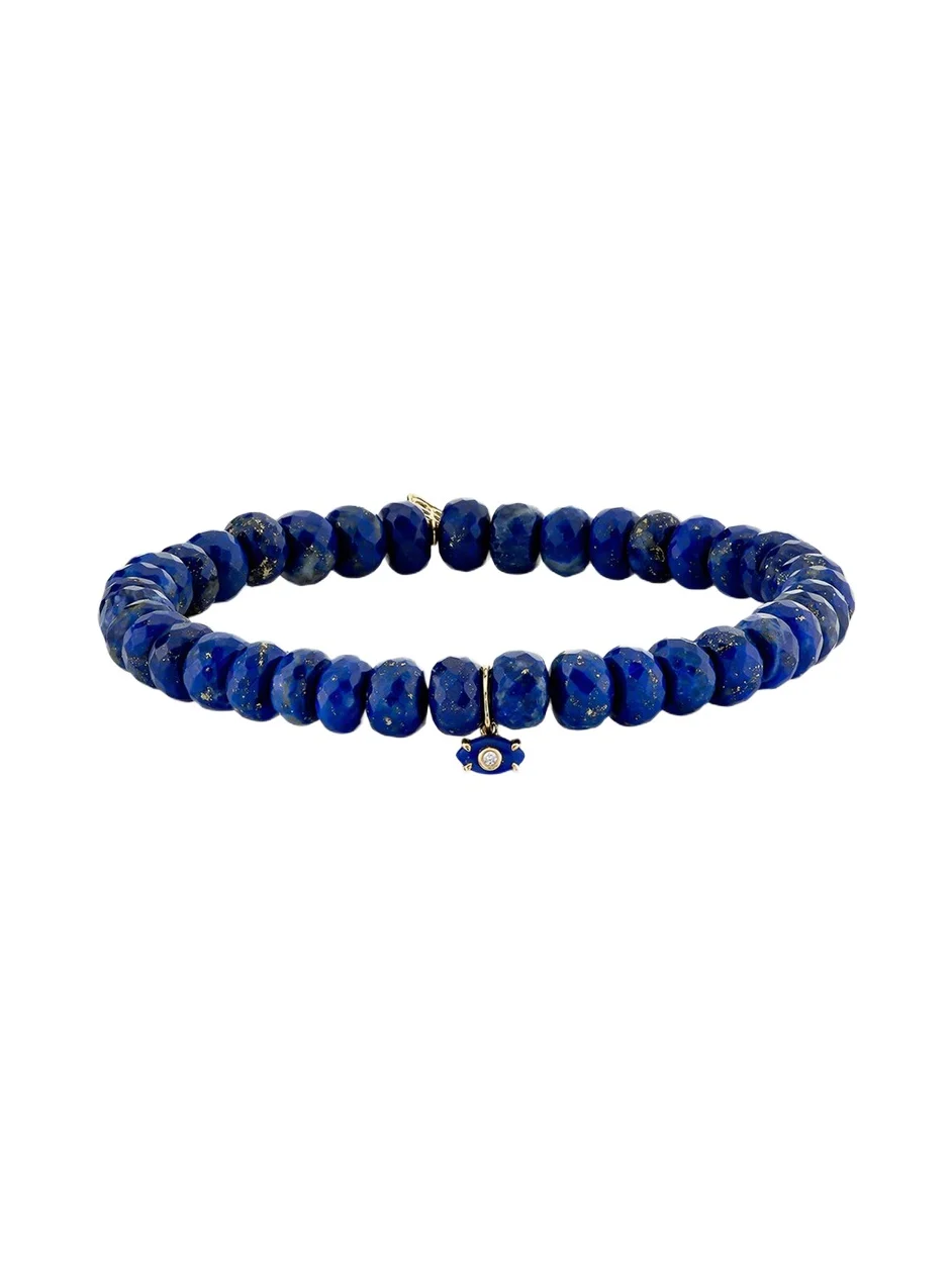 14K Yellow Gold Tiny Carved Lapis Evil Eye Charm on Lapis Rondelle Bracelet 14K Yellow Gold Tiny Carved Lapis Evil Eye Charm on Lapis Rondelle Bracelet