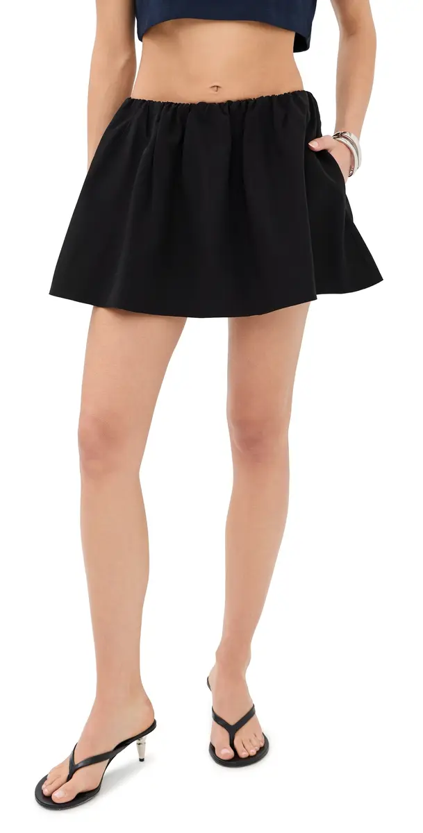 WARDROBE.NYC WARDROBE. NYC Ruched Mini Skirt Black | Image 1 WARDROBE.NYC WARDROBE. NYC Ruched Mini Skirt Black | Image 1