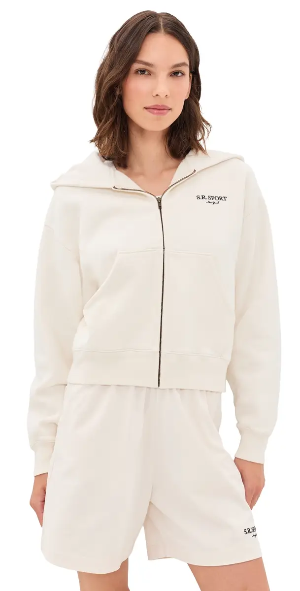 Sporty & Rich R Sport Embroidered Zip Hoodie Ecru Cioco | Image 1 Sporty & Rich R Sport Embroidered Zip Hoodie Ecru Cioco | Image 1