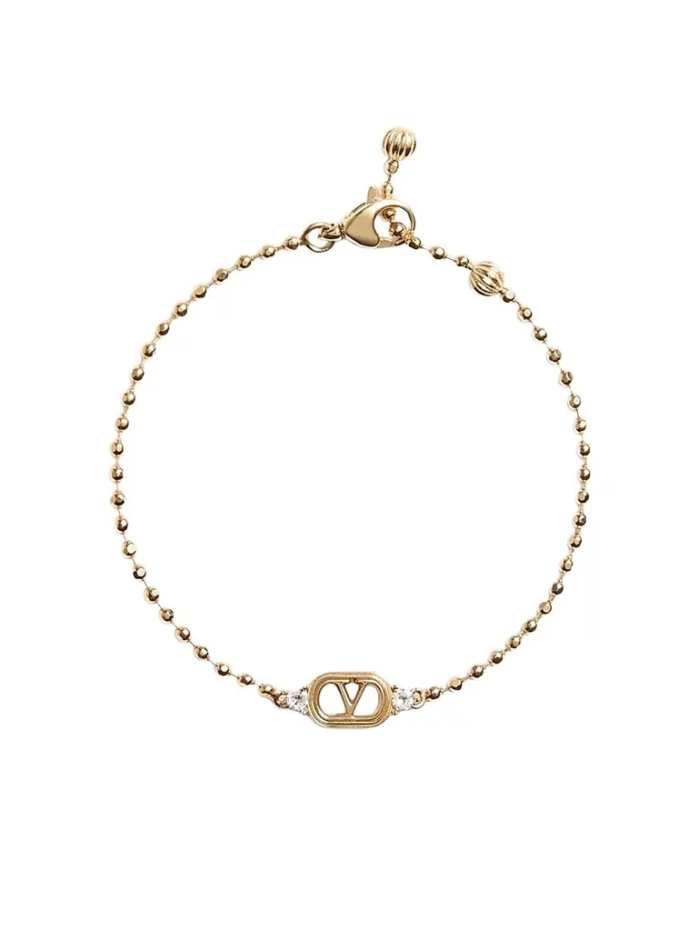 Valentino Garavani Women's Ovalette Metal and Swarovski Crystal Bracelet - Gold Crystal | Image 1 Valentino Garavani Women's Ovalette Metal and Swarovski Crystal Bracelet - Gold Crystal | Image 1