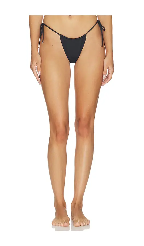 Skims Classic Swim Medallion Tie Side Bikini Bottom | Image 1 Skims Classic Swim Medallion Tie Side Bikini Bottom | Image 1