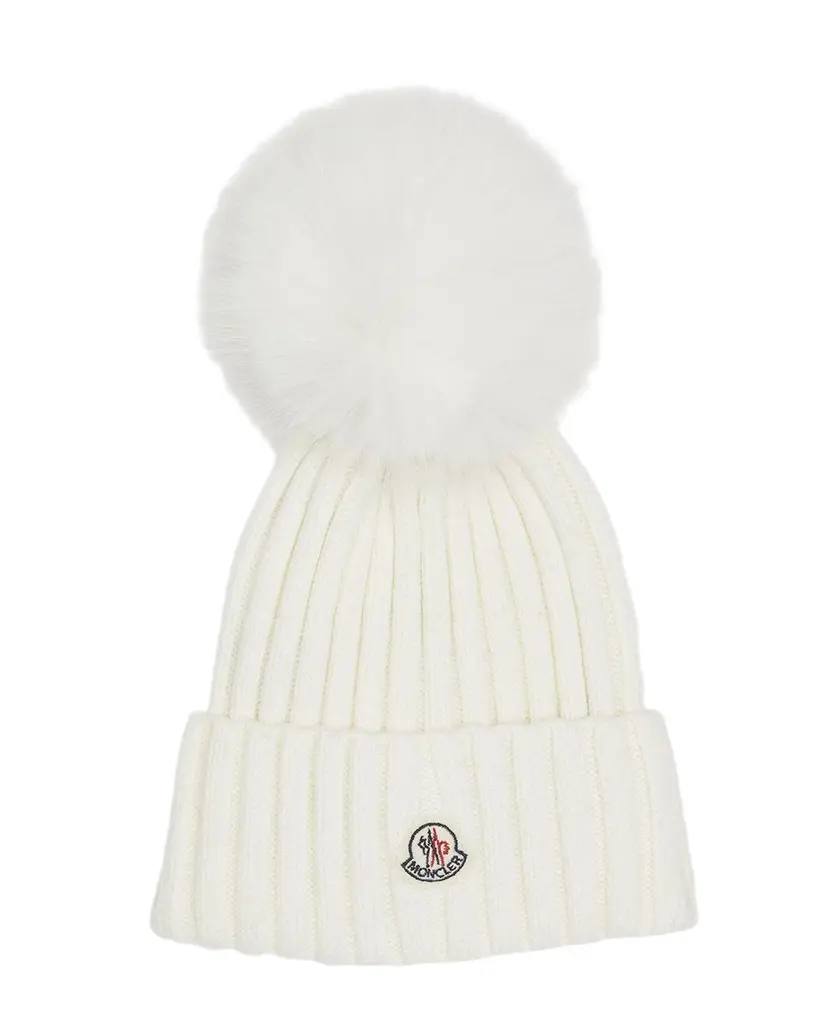 Moncler Ribbed Wool Beanie with Faux Fur Pom | Image 1 Moncler Ribbed Wool Beanie with Faux Fur Pom | Image 1