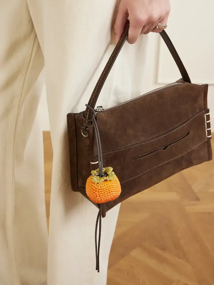 JW Anderson Persimmon Crocheted Cotton And Leather Bag Charm | Thumbnail 2 JW Anderson Persimmon Crocheted Cotton And Leather Bag Charm | Thumbnail 2