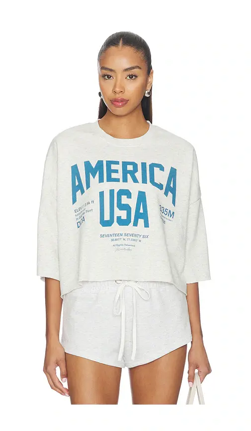 The Laundry Room Welcome To America Crop Jumper | Image 1 The Laundry Room Welcome To America Crop Jumper | Image 1