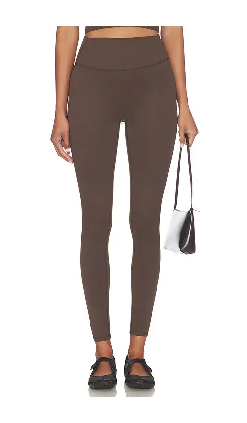 NikeSKIMS Matte 26 Inch Leggings | Image 1 NikeSKIMS Matte 26 Inch Leggings | Image 1