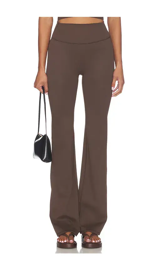 NikeSKIMS Matte Slim Flare Pant | Image 1 NikeSKIMS Matte Slim Flare Pant | Image 1
