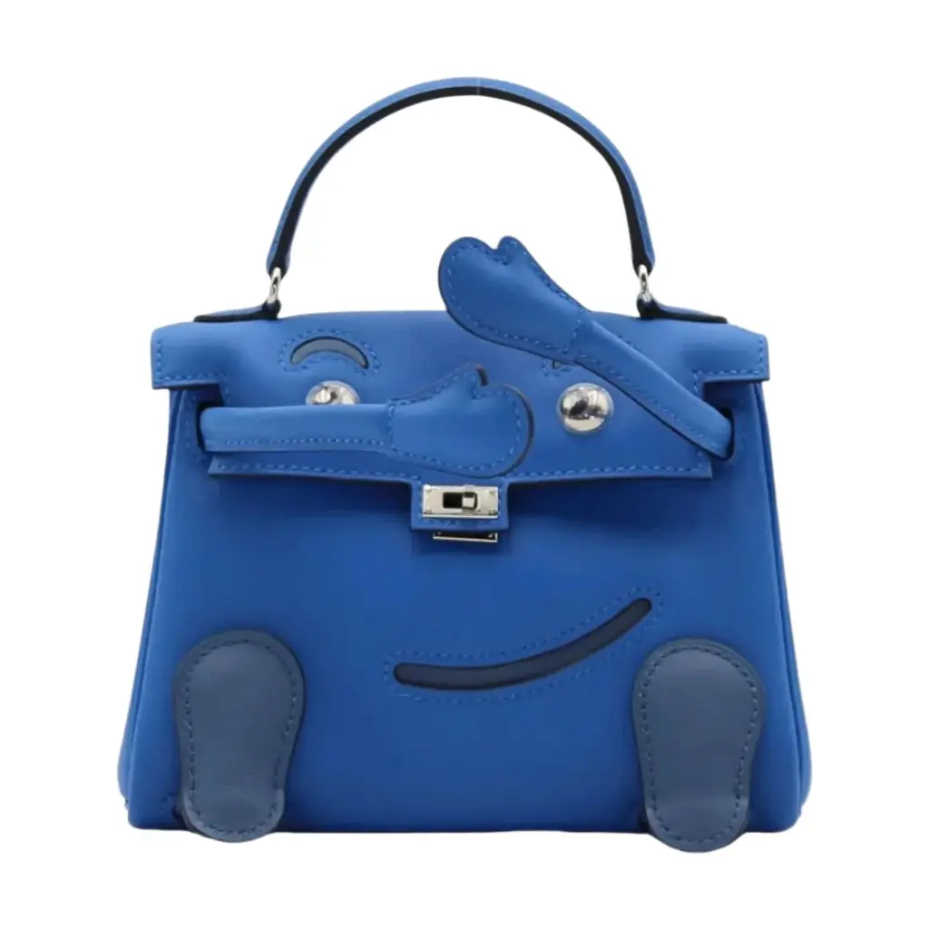 HERMÈS Hermès Kelly Doll Blue Zellige Blue Agate Swift Leather Handbag by The Solist | Image 1 HERMÈS Hermès Kelly Doll Blue Zellige Blue Agate Swift Leather Handbag by The Solist | Image 1