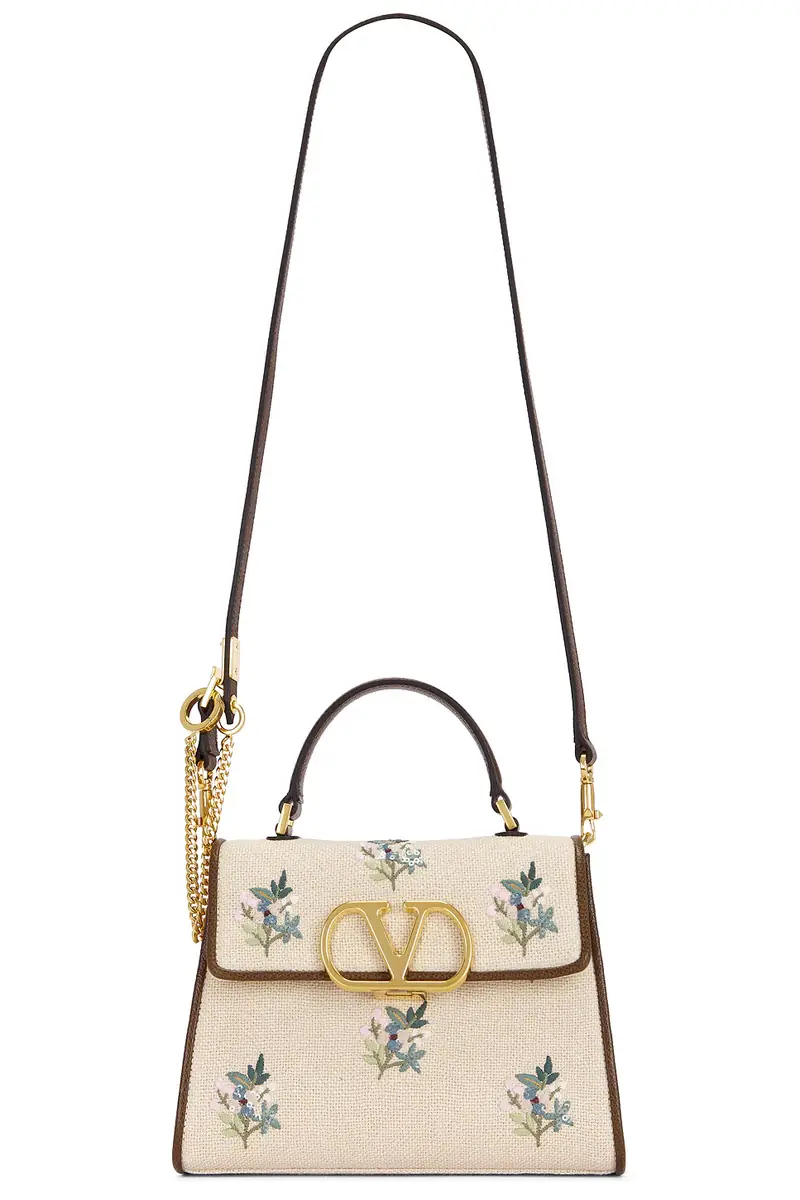Valentino Garavani V Sling Small Top Handle Bag | Image 1 Valentino Garavani V Sling Small Top Handle Bag | Image 1