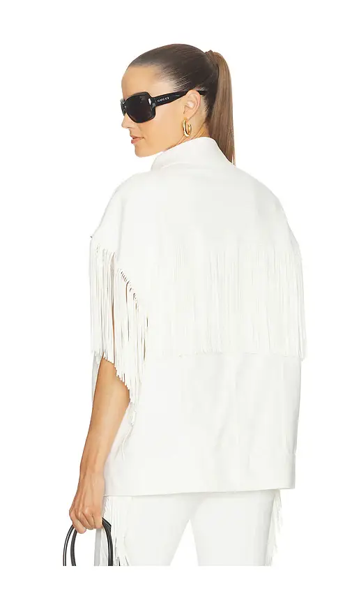 Norma Kamali Sleeveless Oversized Jean Jacket | Image 1 Norma Kamali Sleeveless Oversized Jean Jacket | Image 1