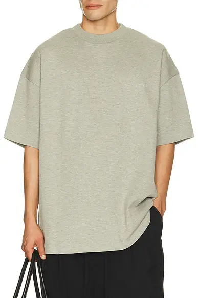 Fear of God Essentials Signature 90's Short Sleeve Tee | Image 1 Fear of God Essentials Signature 90's Short Sleeve Tee | Image 1