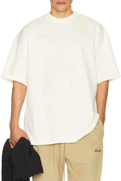 Fear of God Essentials Signature 90's Short Sleeve Tee | Image 1 Fear of God Essentials Signature 90's Short Sleeve Tee | Image 1