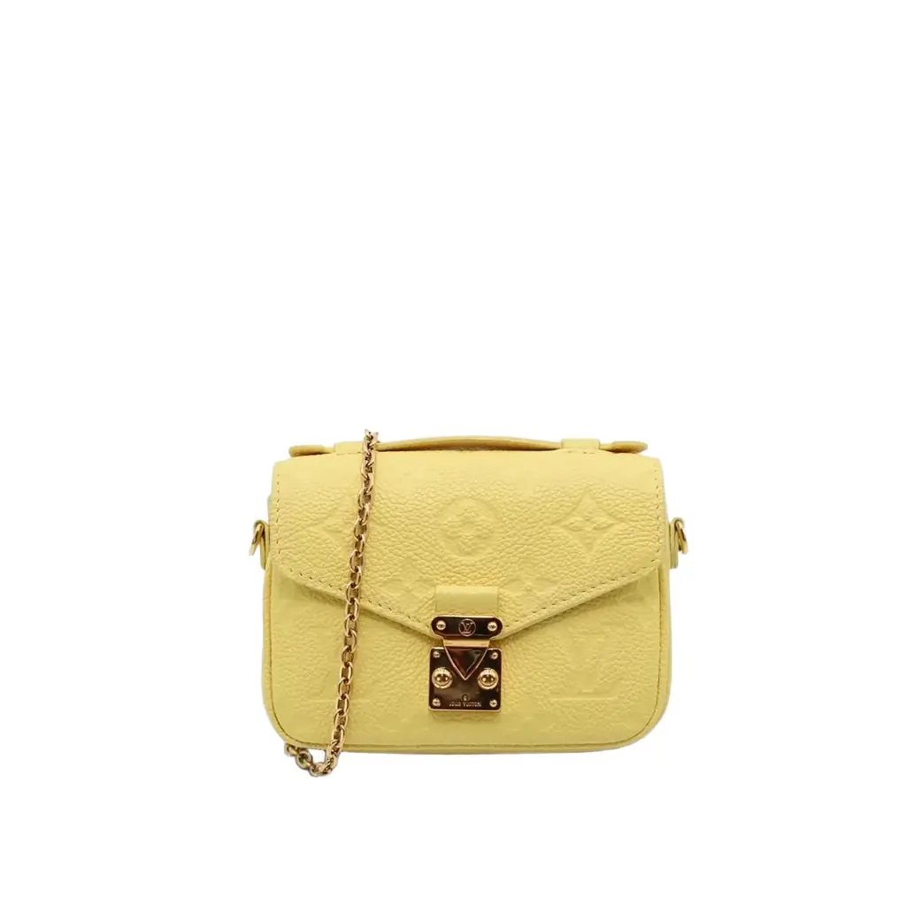 Louis Vuitton Louis Vuitton Metis Micro Yellow Monogram Empreinte Leather Crossbody Bag by The Solist | Image 1 Louis Vuitton Louis Vuitton Metis Micro Yellow Monogram Empreinte Leather Crossbody Bag by The Solist | Image 1