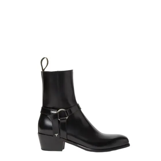 Two metal rings give the Double O ankle boot its Two metal rings give the Double O ankle boot its