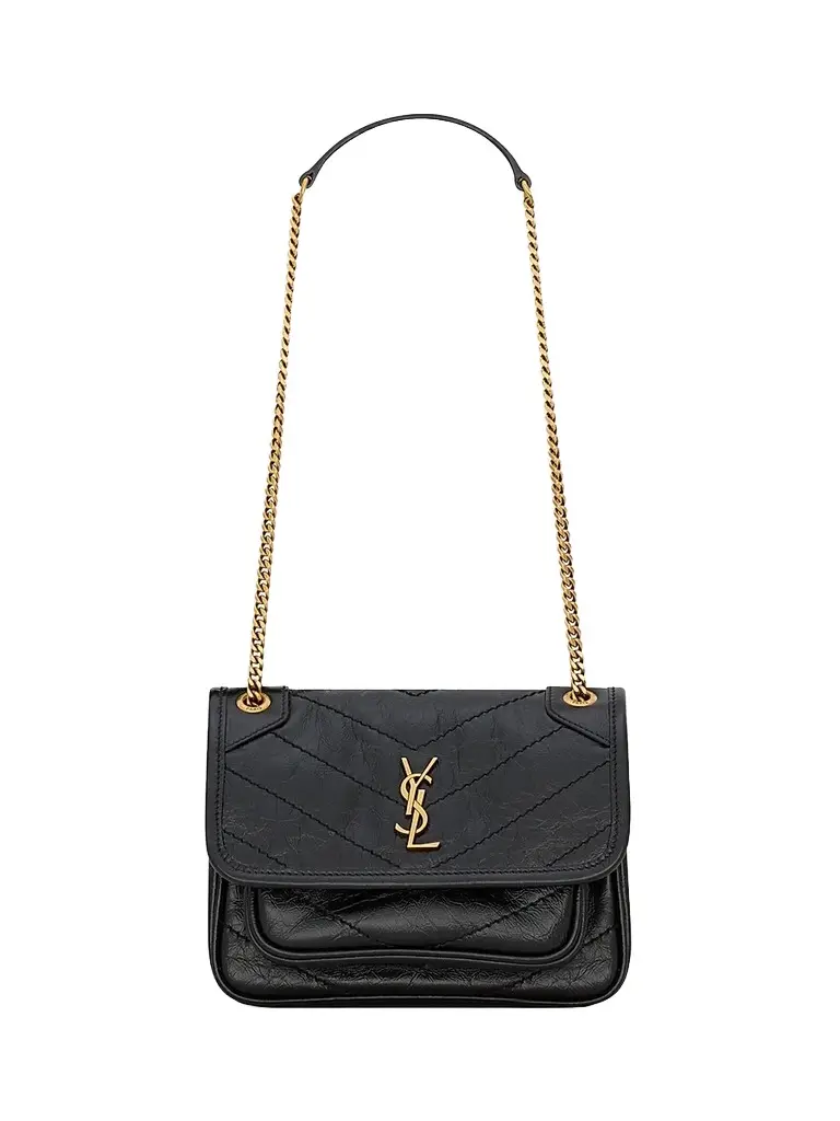 Saint Laurent Women's Niki Baby Crossbody Bag in Vintage Leather - Black | Image 1 Saint Laurent Women's Niki Baby Crossbody Bag in Vintage Leather - Black | Image 1