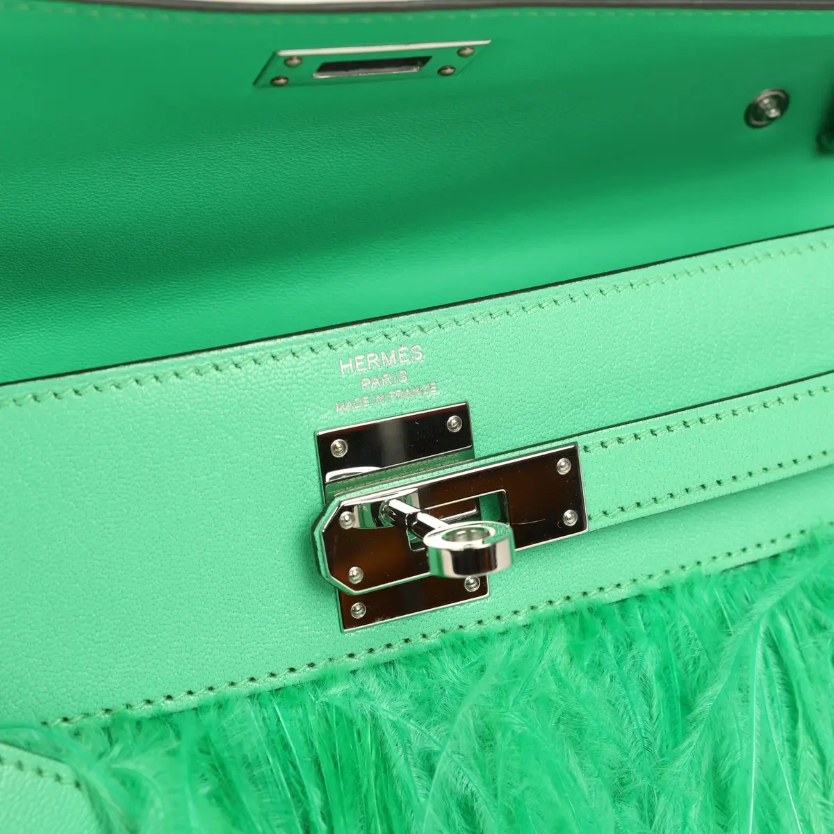 HERMÈS Pre-owned Hermes Kelly Elan Foile Vert Comics Chevre and Ostrich Feather Palladium Hardware | Thumbnail 7 HERMÈS Pre-owned Hermes Kelly Elan Foile Vert Comics Chevre and Ostrich Feather Palladium Hardware | Thumbnail 7