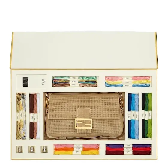 Fendi Iconic Baguette® bag made of perforated cotton | Image 1 Fendi Iconic Baguette® bag made of perforated cotton | Image 1