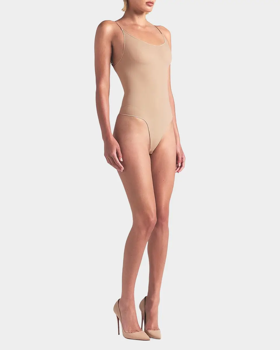 Skims Sheer Seamless Smoothing Thong Bodysuit | Thumbnail 2 Skims Sheer Seamless Smoothing Thong Bodysuit | Thumbnail 2