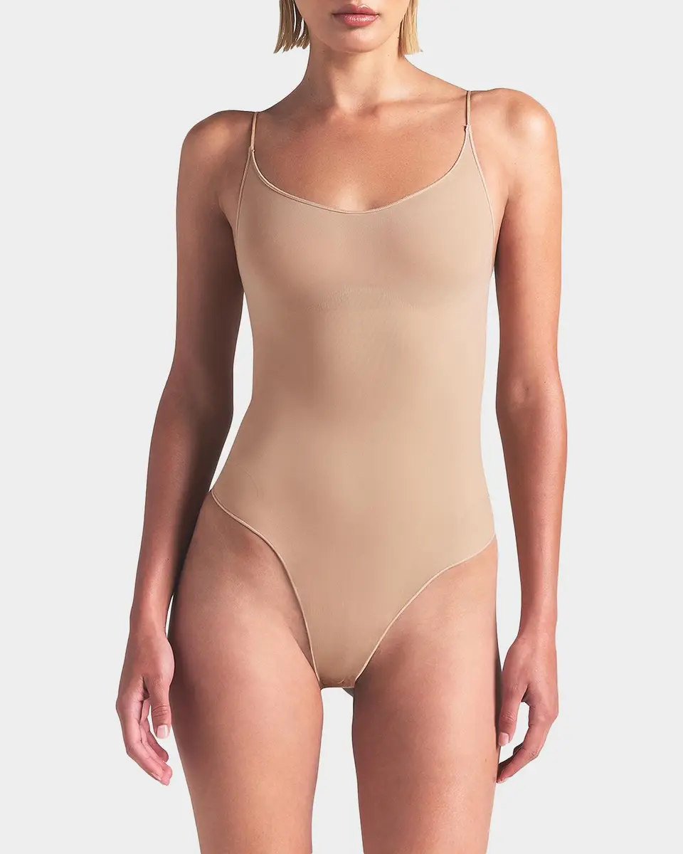 Skims Sheer Seamless Smoothing Thong Bodysuit | Thumbnail 4 Skims Sheer Seamless Smoothing Thong Bodysuit | Thumbnail 4