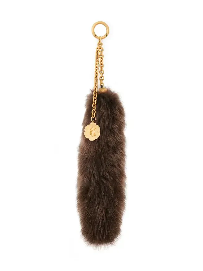 The Treasure Tails charm in shearling The Treasure Tails charm in shearling