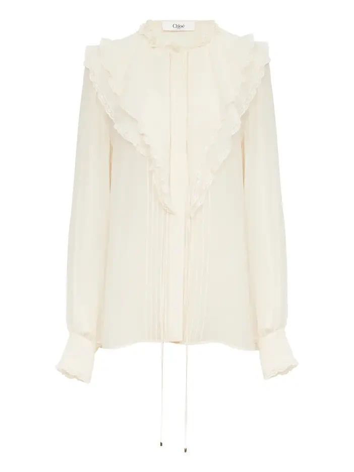 Ruffled blouse in silk georgette