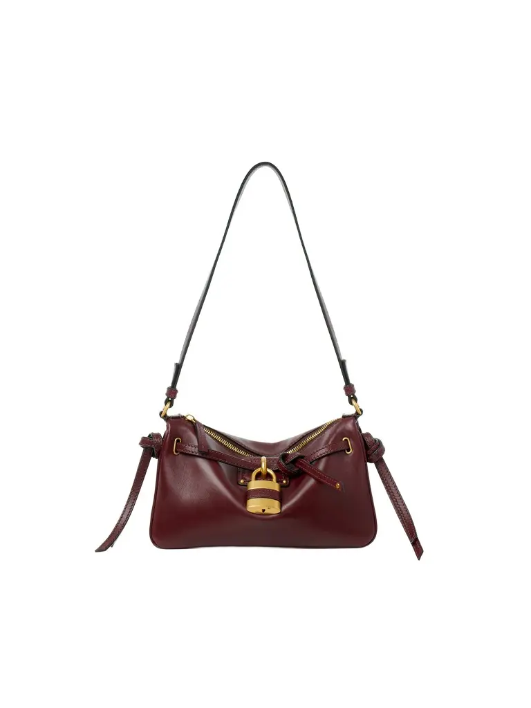 Mini Paddington Sling pouch with strap in soft leather Mini Paddington Sling pouch with strap in soft leather
