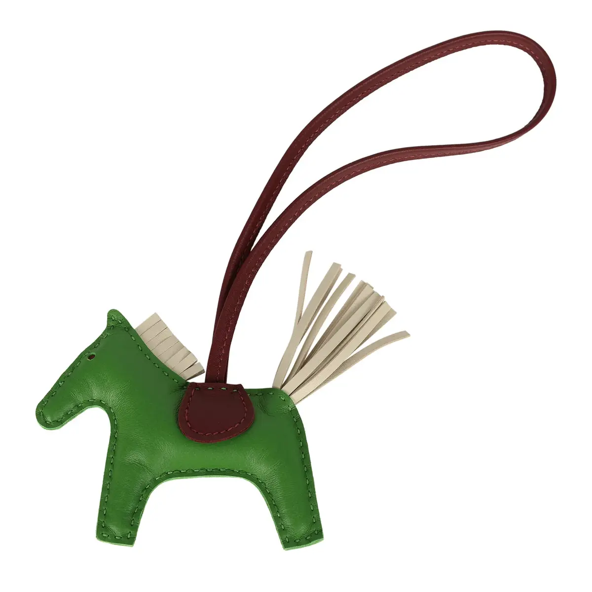 HERMÈS Hermes Rodeo Bag Charm PM Vert Yucca, Craie, Rouge H Milo Lambskin | Image 1 HERMÈS Hermes Rodeo Bag Charm PM Vert Yucca, Craie, Rouge H Milo Lambskin | Image 1