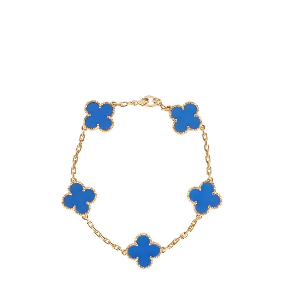 Van Cleef & Arpels Van Cleef & Arpels Vintage Alhambra 5 Motif Bracelet Blue Agate 18K Yellow Gold | Image 1 Van Cleef & Arpels Van Cleef & Arpels Vintage Alhambra 5 Motif Bracelet Blue Agate 18K Yellow Gold | Image 1