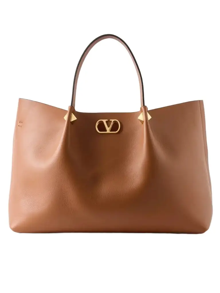 Valentino Garavani Vlogo Signature Studded Leather Tote | Image 1 Valentino Garavani Vlogo Signature Studded Leather Tote | Image 1