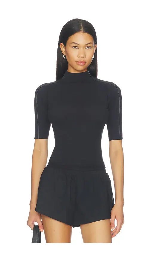 NikeSKIMS Weightless Short Sleeve Top | Image 1 NikeSKIMS Weightless Short Sleeve Top | Image 1