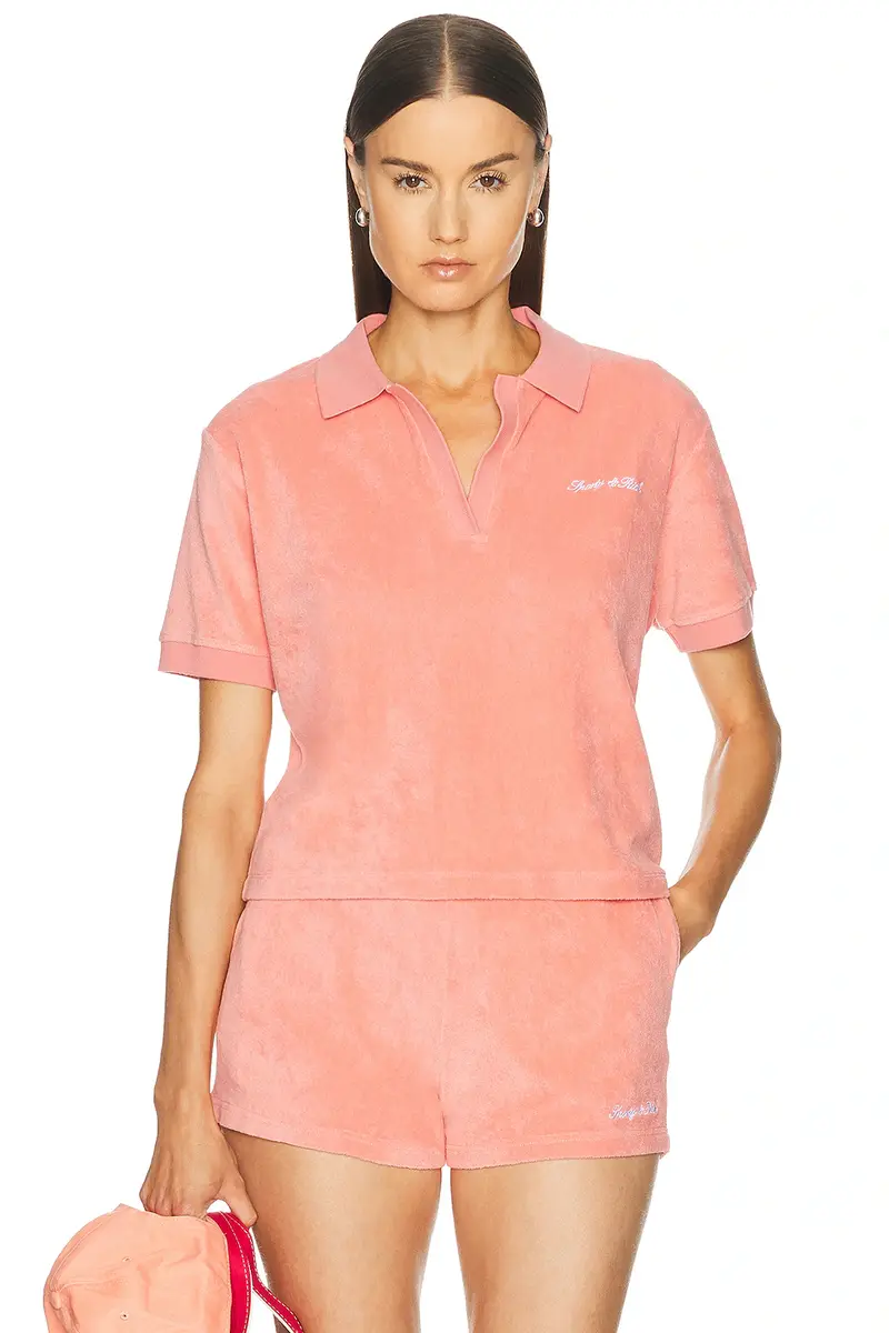 Sporty & Rich Signature Logo Terry Polo Top | Image 1 Sporty & Rich Signature Logo Terry Polo Top | Image 1