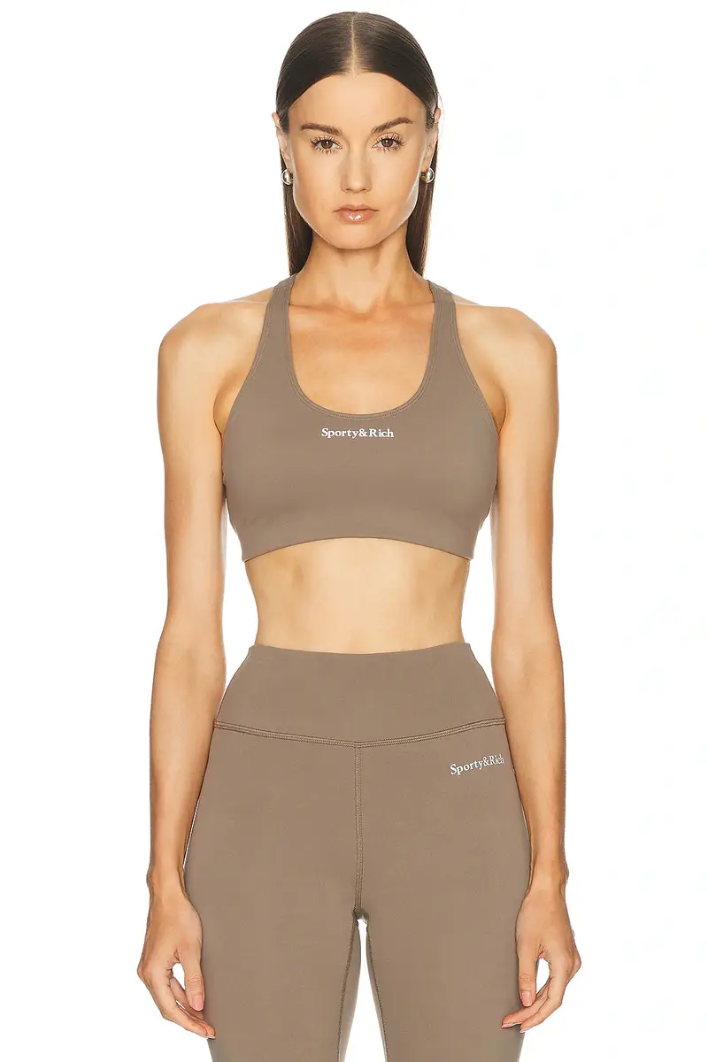Sporty & Rich Serif Logo Sports Bra | Image 1 Sporty & Rich Serif Logo Sports Bra | Image 1