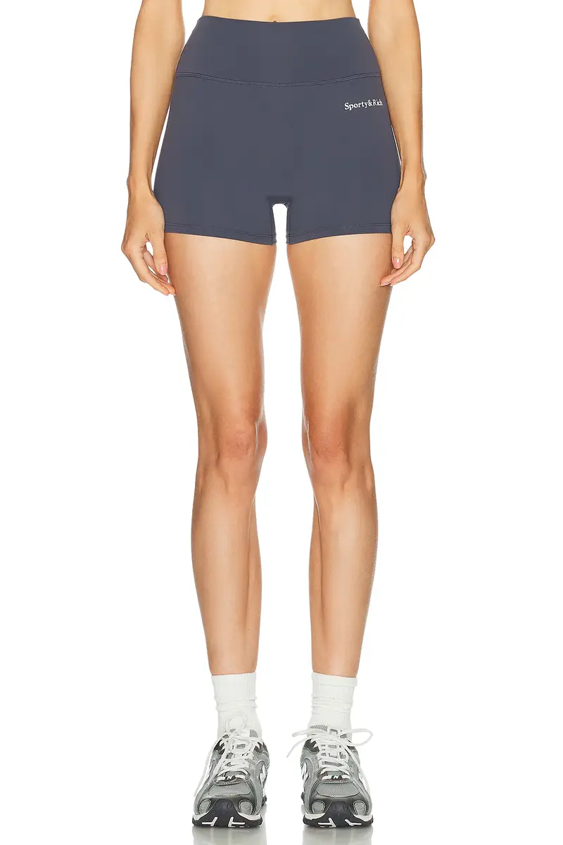Sporty & Rich Serif Logo Mini Biker Short | Image 1 Sporty & Rich Serif Logo Mini Biker Short | Image 1