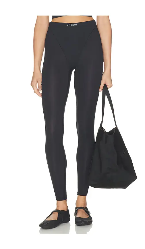 NikeSKIMS Weightless V- Panel Tights | Image 1 NikeSKIMS Weightless V- Panel Tights | Image 1