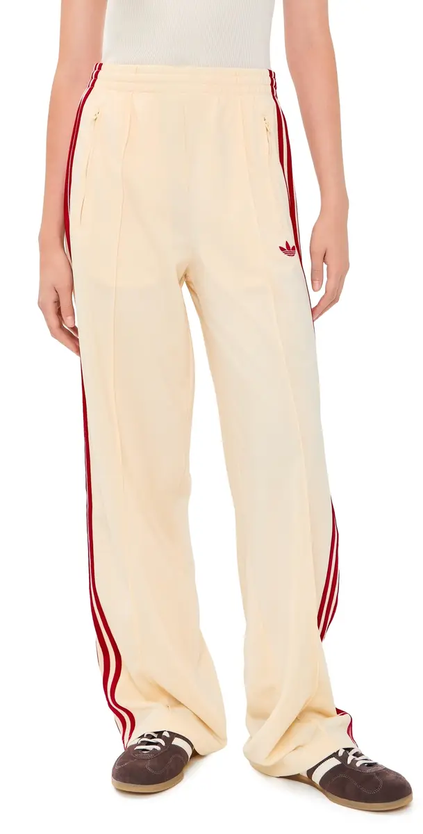 Adidas Firebird Loose Track Pants Warm Vanilla/Team Victory Red XS | Image 1 Adidas Firebird Loose Track Pants Warm Vanilla/Team Victory Red XS | Image 1
