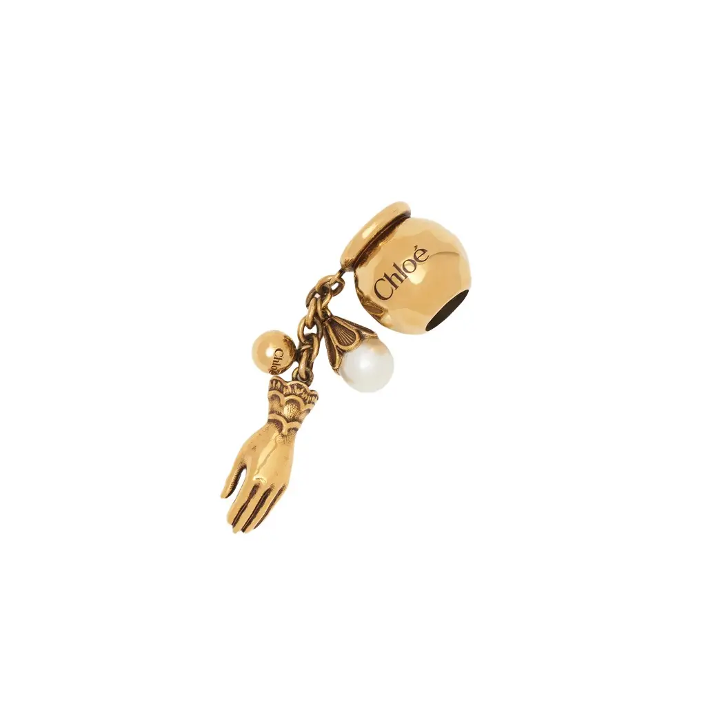 Chloé Sphere Hand & Pearl Dice charm for Bracelet bag in brass | Image 1 Chloé Sphere Hand & Pearl Dice charm for Bracelet bag in brass | Image 1