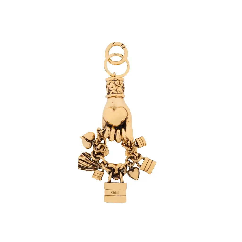 Chloé Chloé Symbols Hand & Heart key ring bag charm in copper | Image 1 Chloé Chloé Symbols Hand & Heart key ring bag charm in copper | Image 1