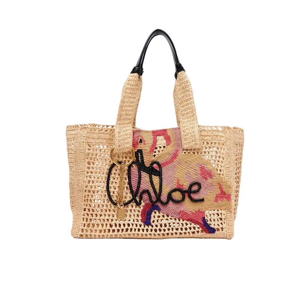 Chloé Summer Banana east-west tote bag in raffia | Image 1 Chloé Summer Banana east-west tote bag in raffia | Image 1