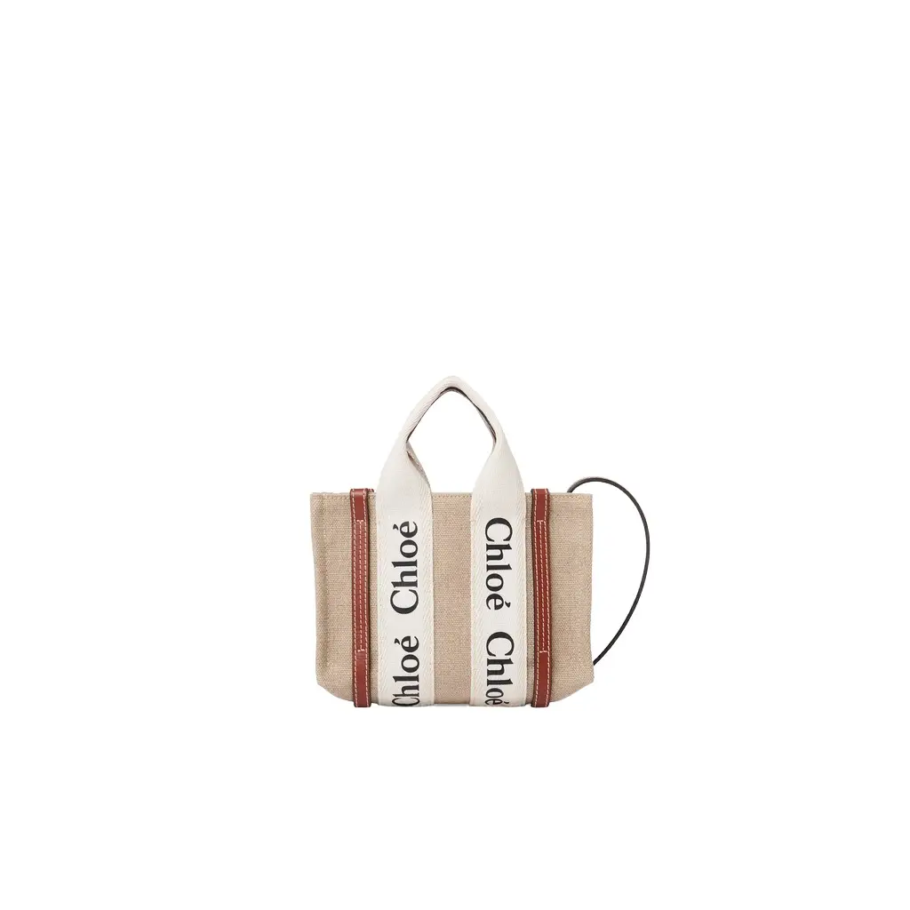 Chloé Mini Woody tote bag in linen | Image 1 Chloé Mini Woody tote bag in linen | Image 1