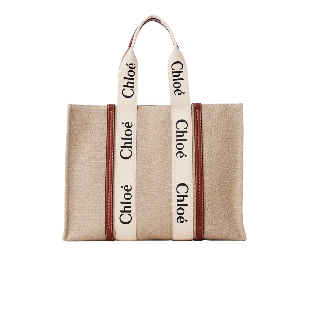 Chloé Large Woody tote bag in linen | Image 1 Chloé Large Woody tote bag in linen | Image 1