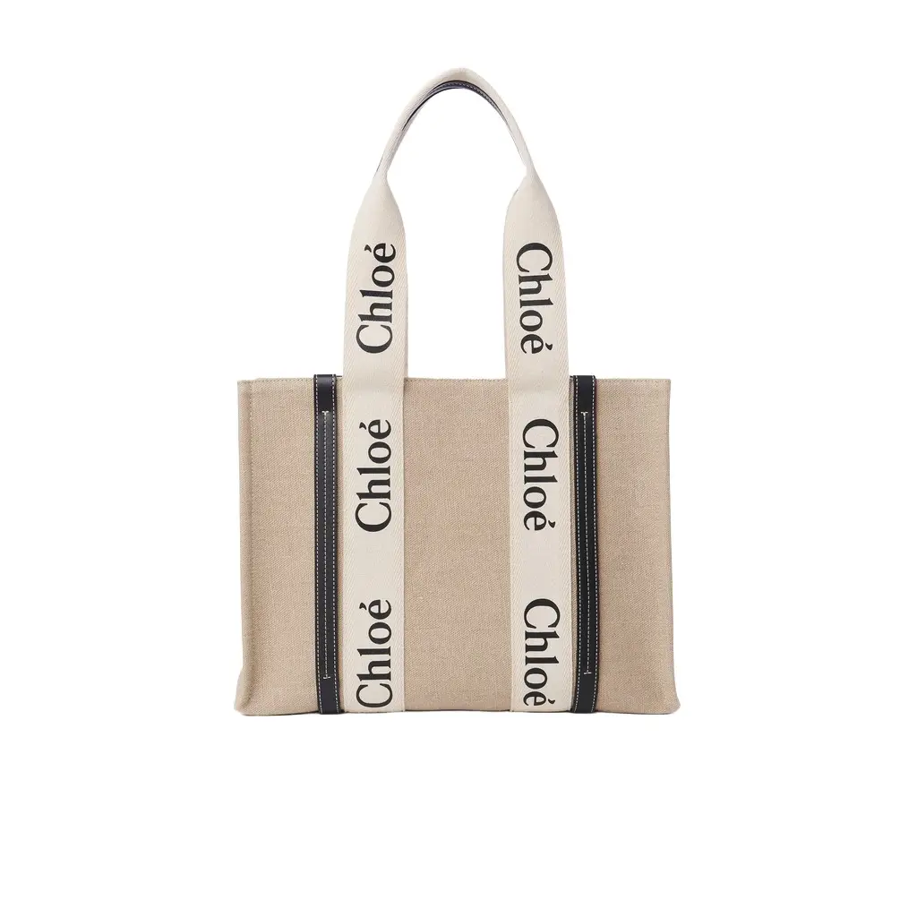 Chloé Woody tote bag in linen | Image 1 Chloé Woody tote bag in linen | Image 1