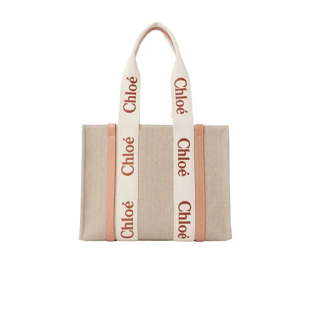 Chloé Woody tote bag in linen | Image 1 Chloé Woody tote bag in linen | Image 1