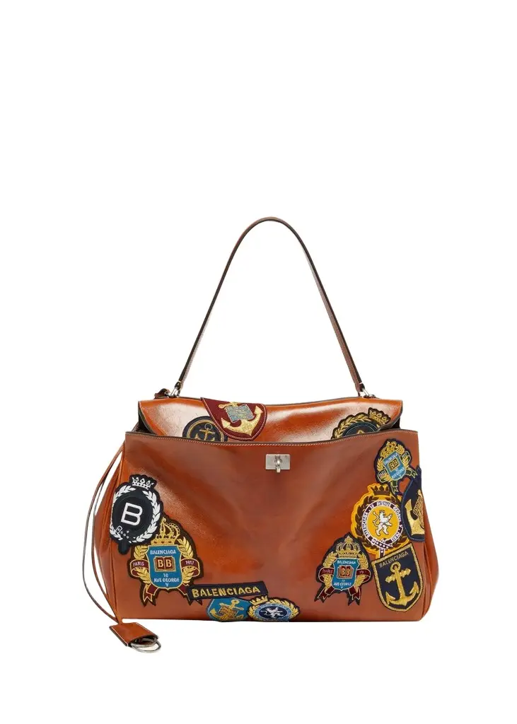 Balenciaga Men's Rodeo Multi-Patch Leather Top-Handle Bag | Image 1 Balenciaga Men's Rodeo Multi-Patch Leather Top-Handle Bag | Image 1